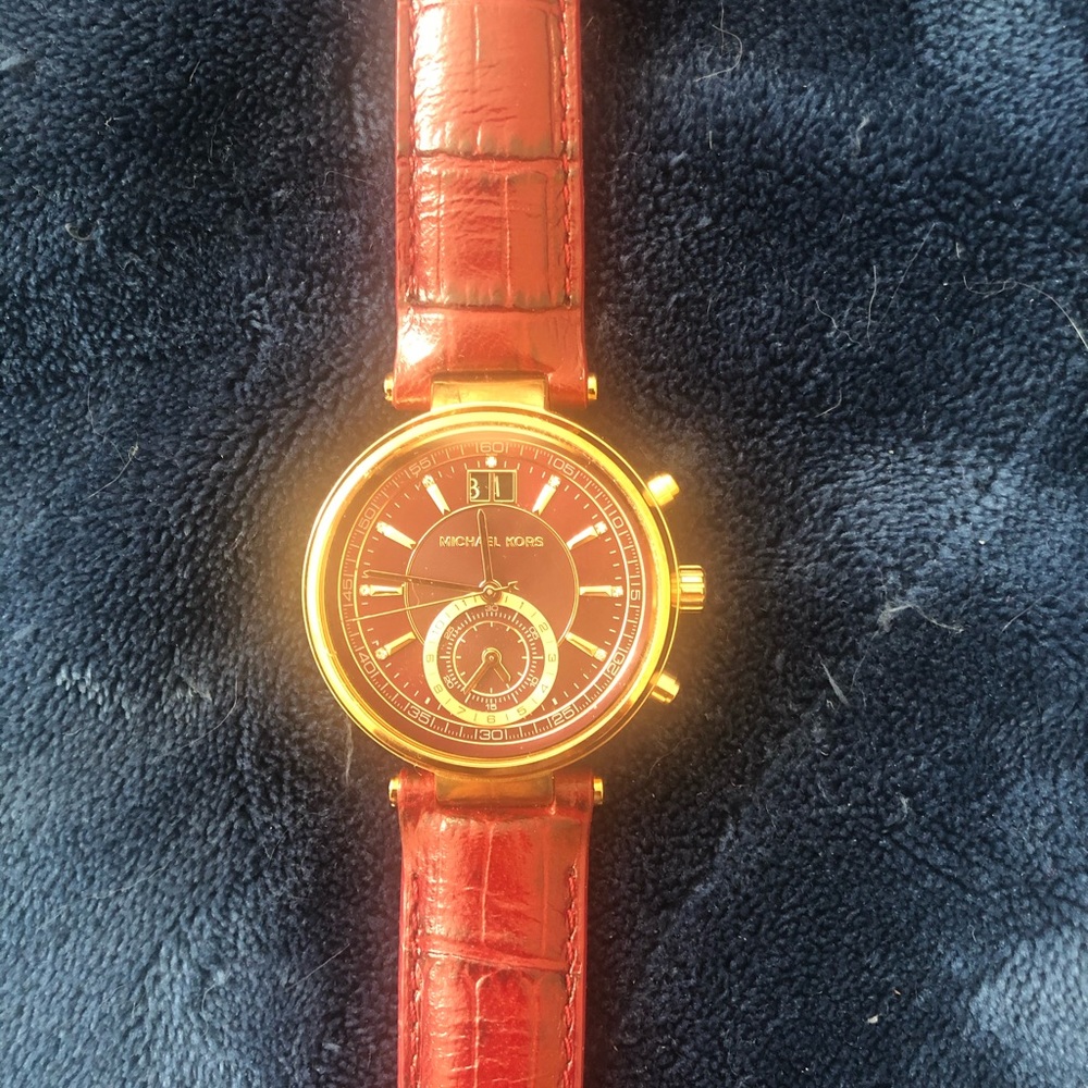 2 Michael Kors watches. $135  each. Both for $199.